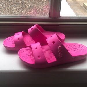 Size 11 Women’s Hot Pink Crocs, worn maybe 3 times inside